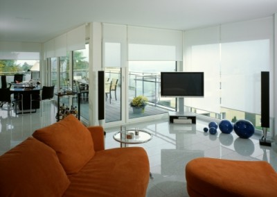 living room interior with roller blinds